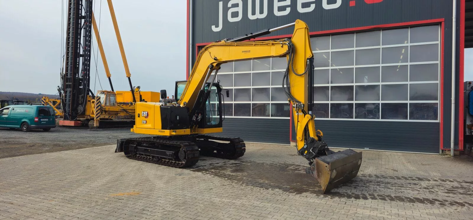 Fahrzeugabbildung CAT 310 Gewicht 11 to kein 311 312 314