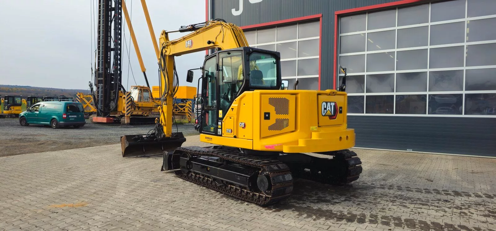 Fahrzeugabbildung CAT 310 Gewicht 11 to kein 311 312 314